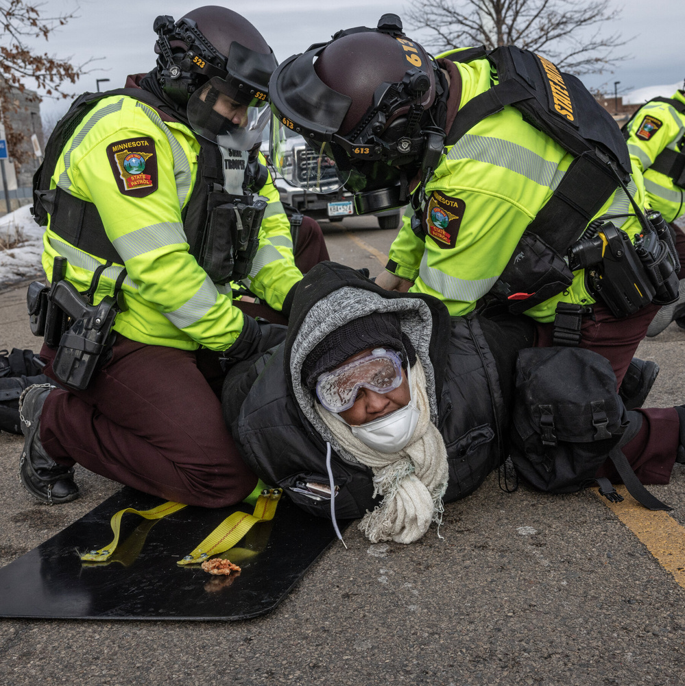 Image for the article: At Least 50 Arrested After Protests Escalate Outside Minnesota Federal Building