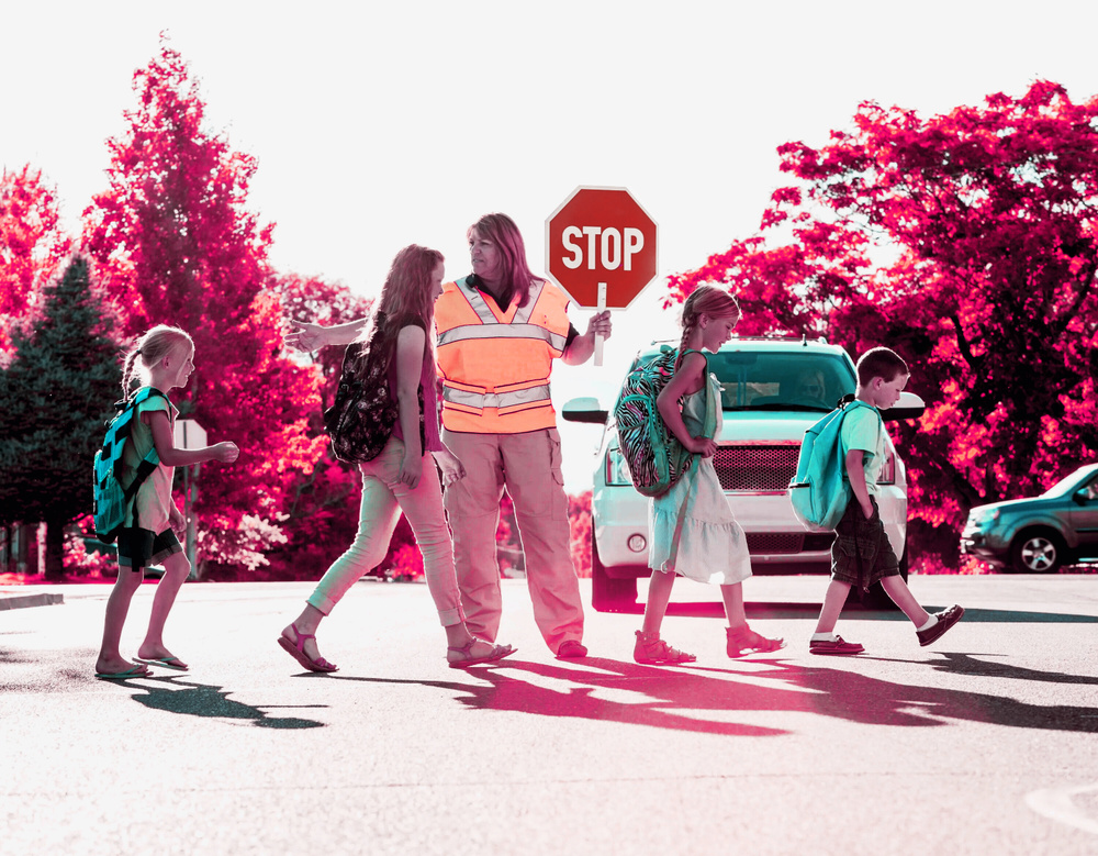 Image for the article: This School Crossing Guard’s Side Hustle Earns $14,000 a Month: ‘The Response to it Has Been Crazy’