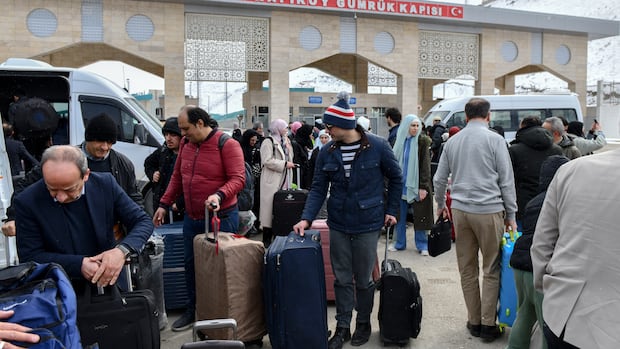 Image for the article: Iran has been cut off by internet blackouts. Those leaving the country give glimpse of the reality on ground