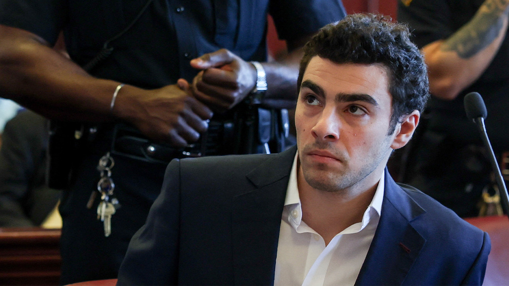 Image for the article: Luigi Mangione complains of double jeopardy in courtroom outburst