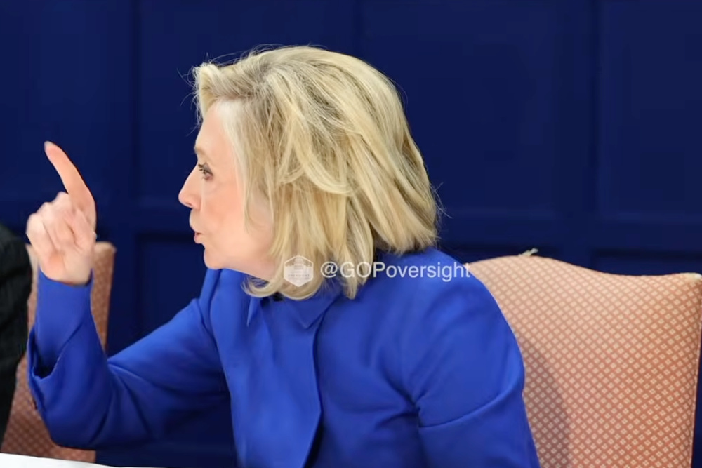 Image for the article: Moment Hillary Clinton storms out of Epstein hearing after learning Lauren Boebert leaked her photo