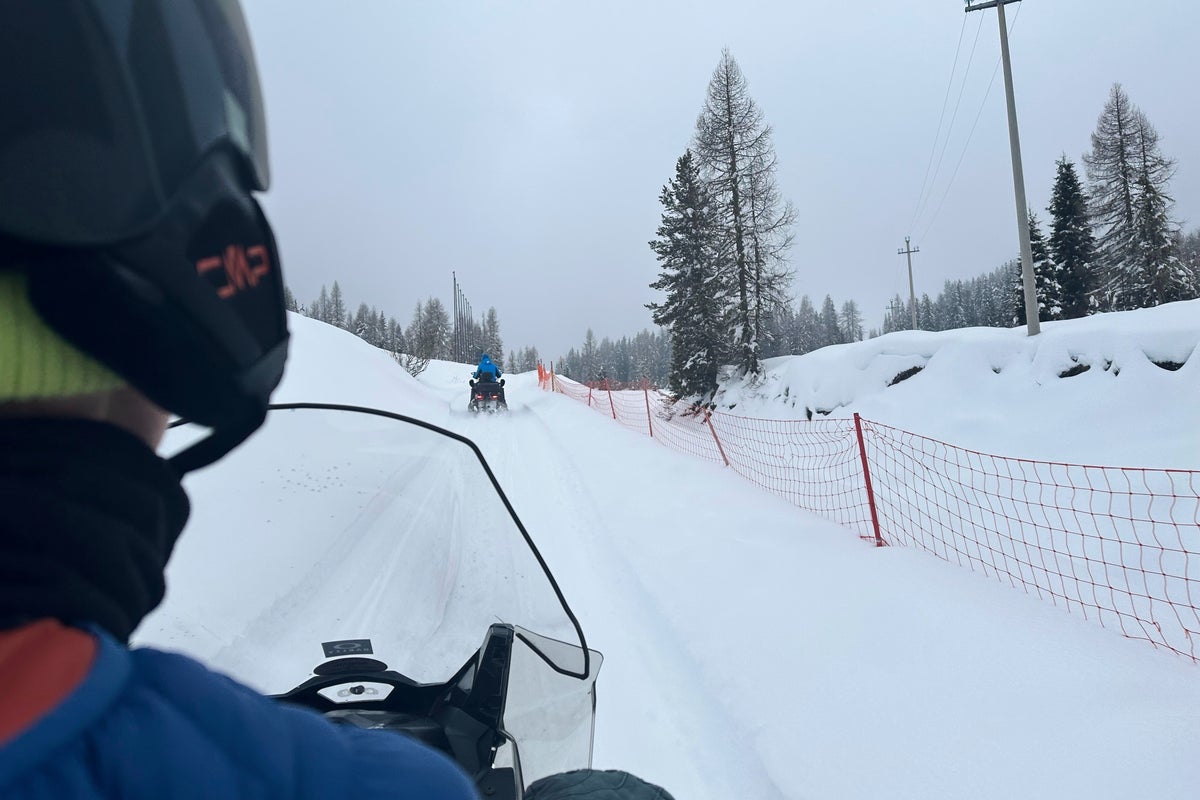 Image for the article: Olympic tourists in Cortina can explore the Dolomites with the new 'Uber Snowmobile' service
