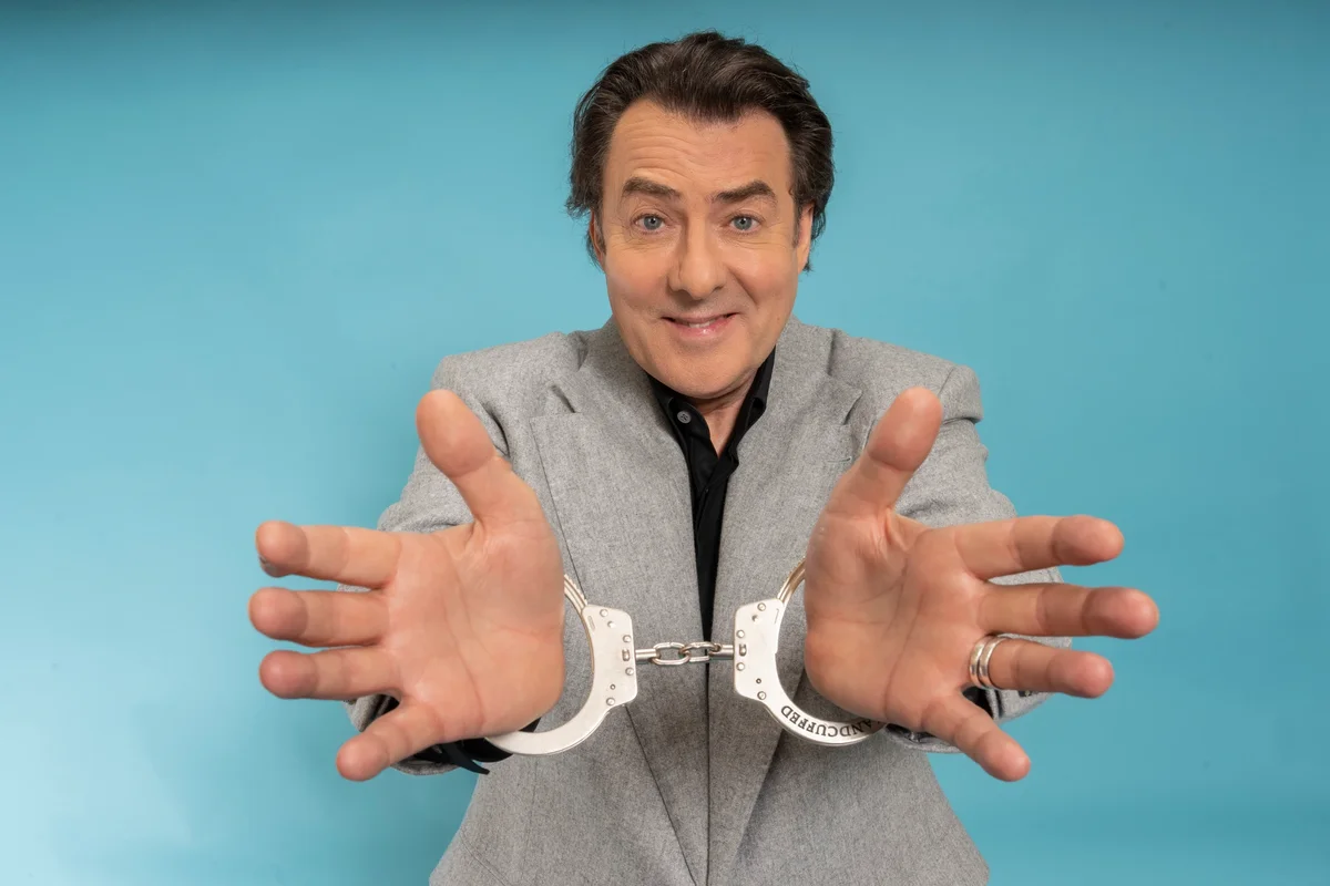 Image for the article: Handcuffed: Last Pair Standing review – Jonathan Ross’s experiment is a dismal exercise in culture-war needling