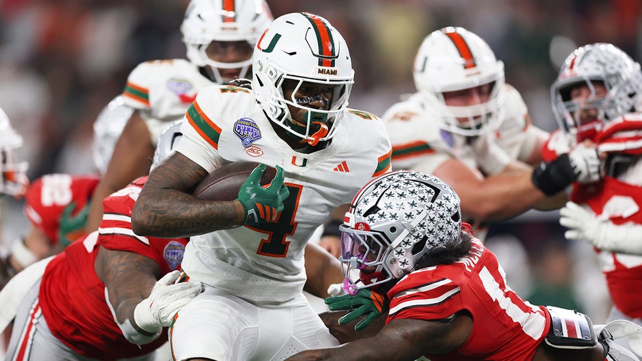 Image for the article: Miami upsets Ohio State for shocking CFP win, ends Buckeyes' back-to-back national title hopes